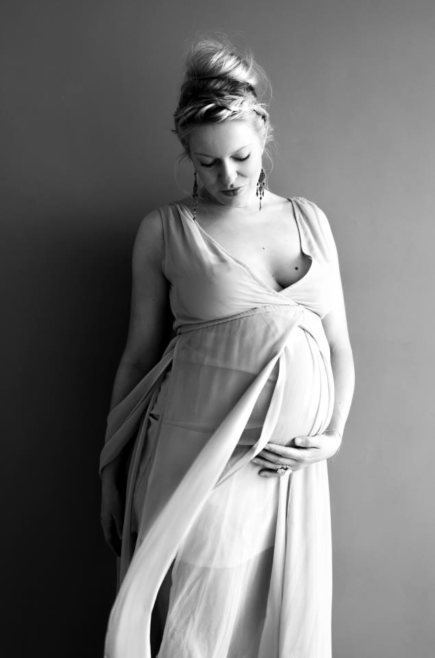 Photo of a pregnant Anna.